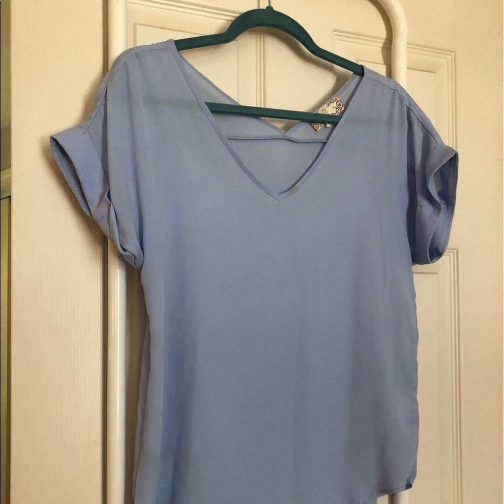 Soft blue Rayon. Great with jeans or leggings
